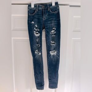 American Eagle Outfitters ripped blue jeans (next level stretch) size 0